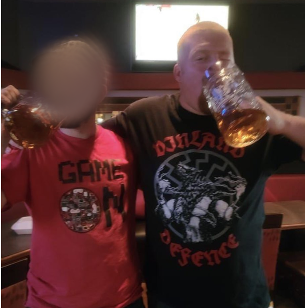 Picture of Alex at a bar wearing neo-Nazi symbols on his clothing.